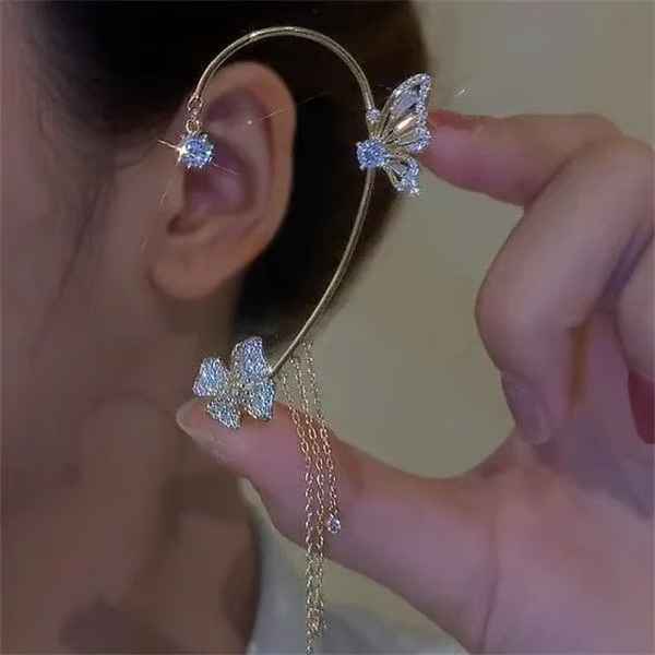 Boucles d'oreilles pendantes papillon à pompon et zircon